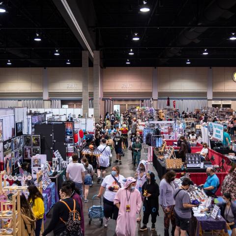 Elevated view of a busy Naka-Kon exhibit hall