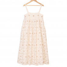 off white dress with shoulder straps with white flower pattern